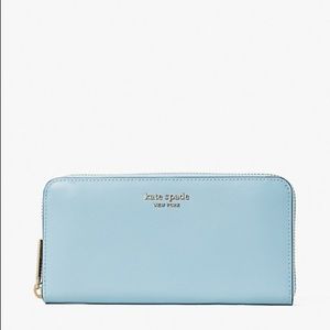 Kate spade continental wallet in baby blue